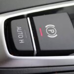 bmw x5 auto hold.jpg,اتوهلد چیست و نحوه عملکرد اتو هلد چگونه است؟,اتوکالا Autokala